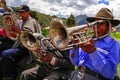 Quechua native men from Peru in playing music