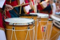 Group of Men Dressed in Medieval Clothes Playing Drums