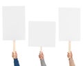 Group of men holding blank protest signs on white background, closeup Royalty Free Stock Photo