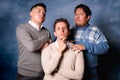 Group of 3 men in jersey on 90\'s yearbook style. Posing funny Royalty Free Stock Photo