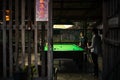 Group of men play pool Royalty Free Stock Photo