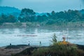 Group of men rowing over the river Royalty Free Stock Photo