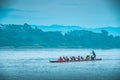 Group of men rowing over the river Royalty Free Stock Photo