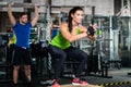 Group of men and woman in functional training gym