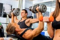 Group of men and women working his body at gym Royalty Free Stock Photo