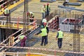 Group of men working at the construction site