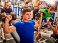 Group of men working his body at gym. Royalty Free Stock Photo