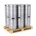 Group of metal beer kegs stacked on pallet