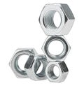 Group of metal nuts with metric thread isolated on white background. Galvanized hex nuts. Metal accessories for assembling metal Royalty Free Stock Photo
