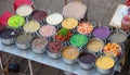 Group of metal pots on a vietnamese street stall containing various kinds of colorful sweet soups Che hem Hue Vietnam