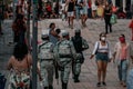 Group of Mexican national guard walking among people on the street in Mexico