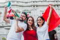 Group of mexican soccer fans holding flags and trumpets in Mexico City Royalty Free Stock Photo