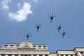 A group of Mi-28N `Night hunter` attack helicopters in the sky over Moscow during the dress rehearsal of the Victory parade Royalty Free Stock Photo
