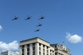 A group of Mi-28N `Night hunter` attack helicopters in the sky over Moscow during the parade dedicated to the 75th anniversary of Royalty Free Stock Photo