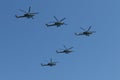 A group of Mi-28N `Night hunter` attack helicopters in the sky over Moscow during the parade dedicated to the 75th anniversary of Royalty Free Stock Photo