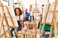 Group of middle age draw students smiling happy drawing at art studio Royalty Free Stock Photo