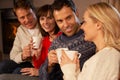 Group Of Middle Aged Couples With Hot Drinks Royalty Free Stock Photo