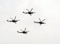 Group of the Mil Mi-28 is a Russian all-weather, day-night, military tandem, two-seat anti-armor attack helicopters in the air. Royalty Free Stock Photo