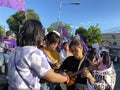 group of militant and revolutionary women GABRIELA singing hymns while holding a protest rally on the city main street