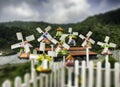 Group of miniature traditional Dutch old wooden windmill with top hill view Royalty Free Stock Photo