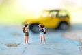 Group Miniature traveler and hiker backpack standing in the forest