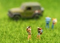 Group Miniature traveler and hiker backpack standing in the forest for the tourist and adventure