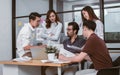 Group of mixed race working people wearing casual business shirt, meeting, presenting, discussing about jobs, project plan, Royalty Free Stock Photo