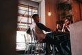 Group of mixed race young men talking in lounge bar. Multiracial friends having fun in cafe Royalty Free Stock Photo