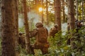 A group of modern warfare soldiers is fighting a war in dangerous remote forest areas. A group of soldiers is fighting