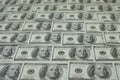 money stack of 100 US dollars banknotes a lot of is arranged in a beautiful, selective focus