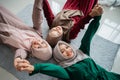 Group of moslem female friends smiled while laying on the mattress