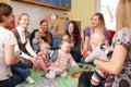 Group Of Mothers With Babies At Playgroup Royalty Free Stock Photo