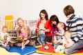 Group of mothers with their babies Royalty Free Stock Photo