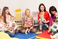 Group of mothers with their babies Royalty Free Stock Photo