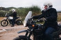 Group of motorcycle bikers on gravel dirt road Royalty Free Stock Photo