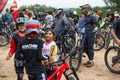 Group of mountain bikers congregate and line up to begin their outdoor adventure