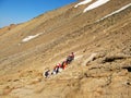 A group of mountaineers climbing Mount Damavand , Iran