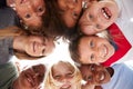 Group Of Multi-Cultural Children With Friends Looking Down Into Camera