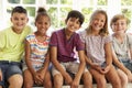 Group Of Multi-Cultural Children On Window Seat Together Royalty Free Stock Photo