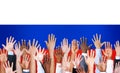 Group of Multi-Ethnic Arms Raised And A Flag Of Russia