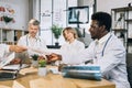 Group of multi ethnic doctors having international training Royalty Free Stock Photo