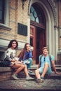 Group of multi ethnic students near university building entrance Royalty Free Stock Photo