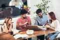 Group of multi ethnic young students preparing for exams Royalty Free Stock Photo