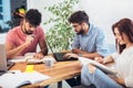 Group of multi ethnic young students preparing for exams Royalty Free Stock Photo