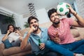 Multi national football fans cheering Royalty Free Stock Photo