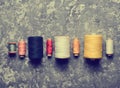 A group of multicolored skeins of thread