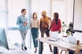 group of multicultural business people having conversation during coffee break Royalty Free Stock Photo