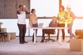 Group of multiethnic business people on construction site Royalty Free Stock Photo