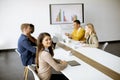 Group of multiethnic business people working together and preparing new project on a meeting in office Royalty Free Stock Photo