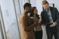 Group of multiethnic business people working together and preparing new project on a meeting in office Royalty Free Stock Photo